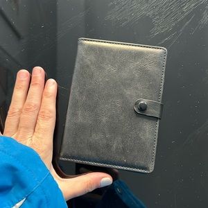 NEW BLACK LEATHER WALLET AND OR PASSPORT HOLDER WITH TRACKING DEVICE CAPABILITY